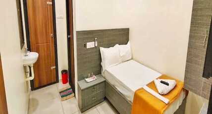 SREE RESIDENCY Room Type - STANDARD AC ROOM