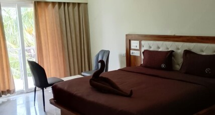 Veena Comforts, Shahapur Room Type - Deluxe Room with Air Conditioning