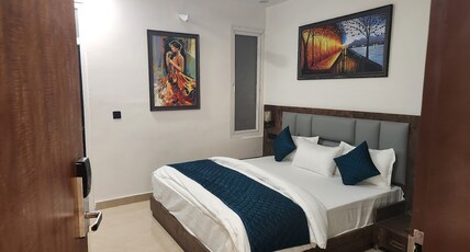 Red Flame Residency Room Type - Classic Double Bed