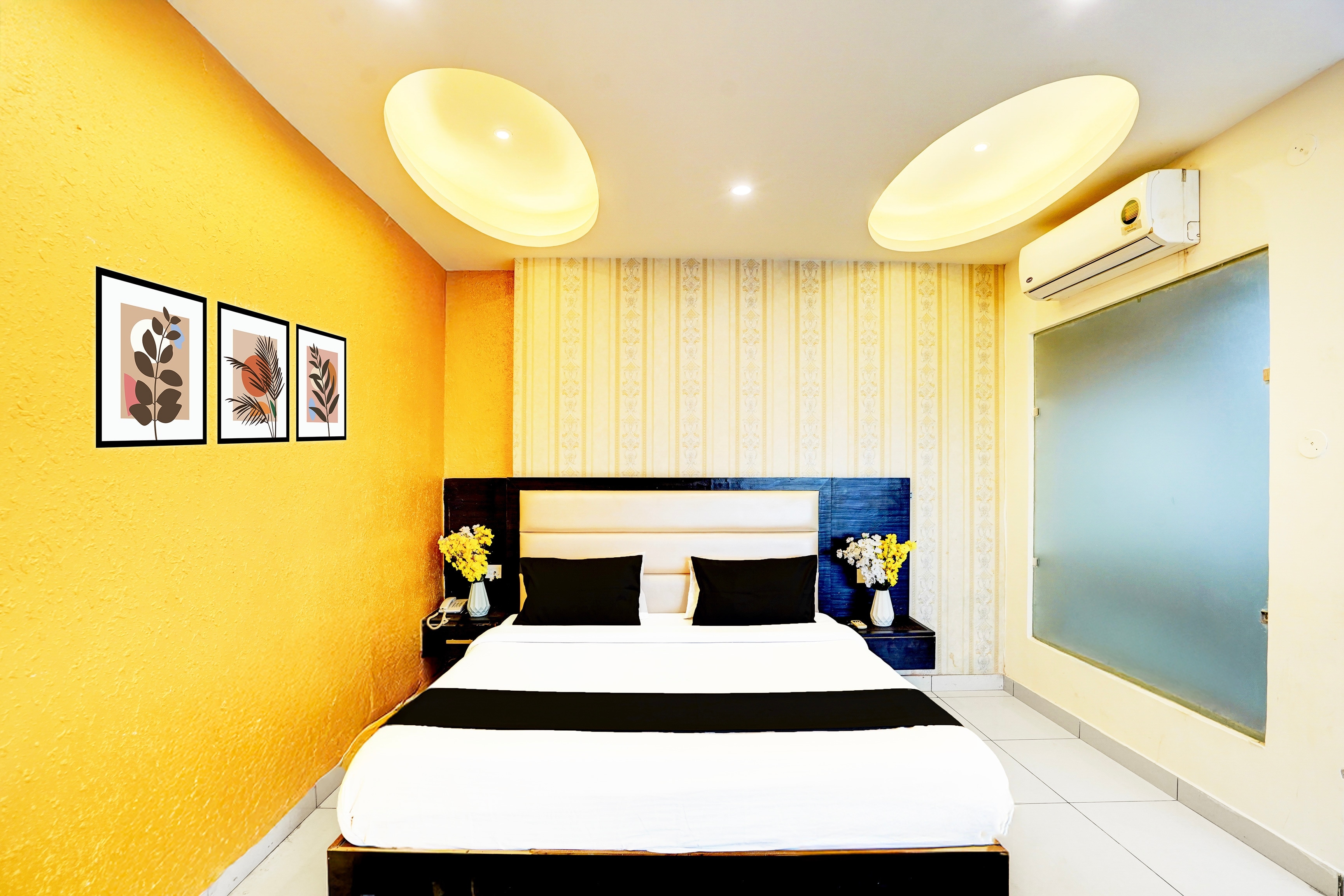 Collection O Surya Enclave Formerly Aroma Regency - Tap to explore photos