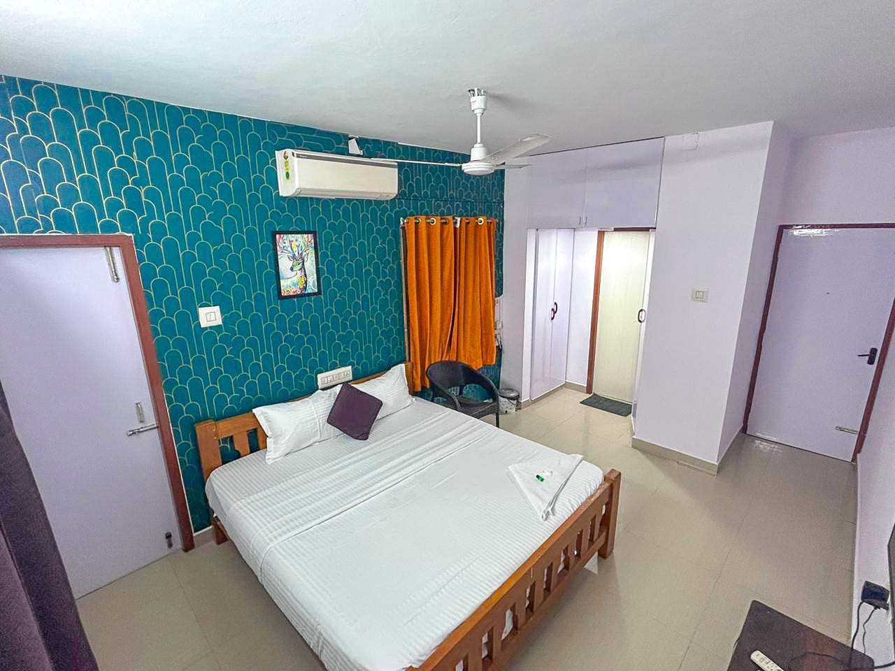 Adora Waves Service Apartment - Tap to explore photos