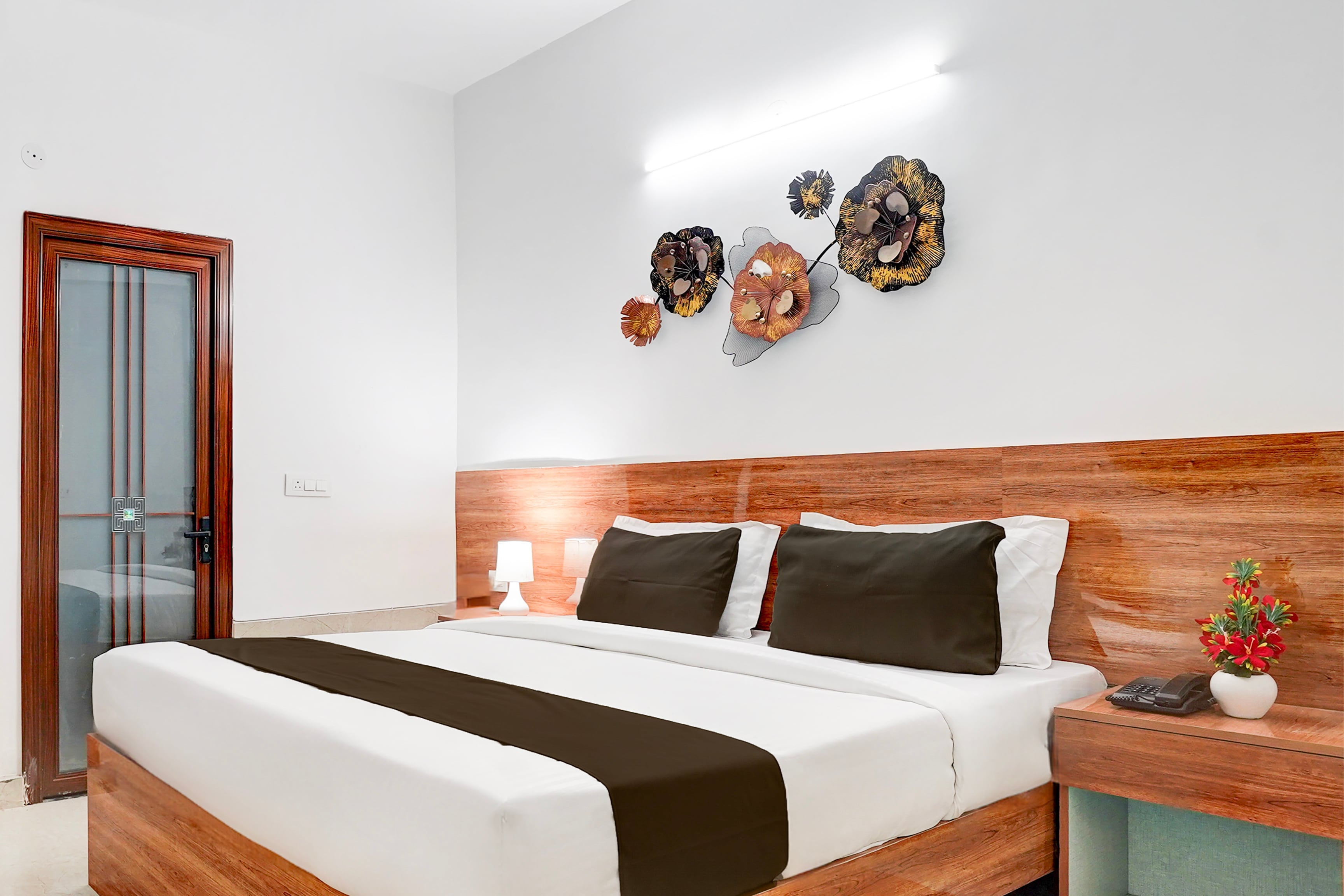 Hotel O Golf Inn Rooms - Tap to explore photos