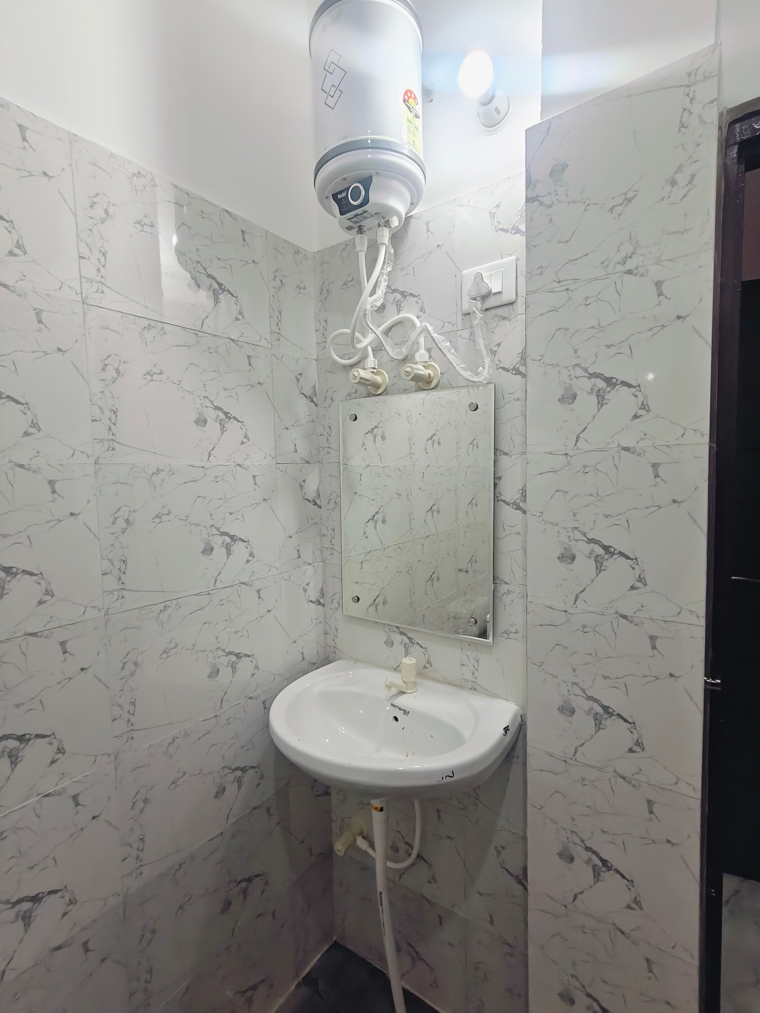 Shri Vinayak Rooms - Tap to explore photos