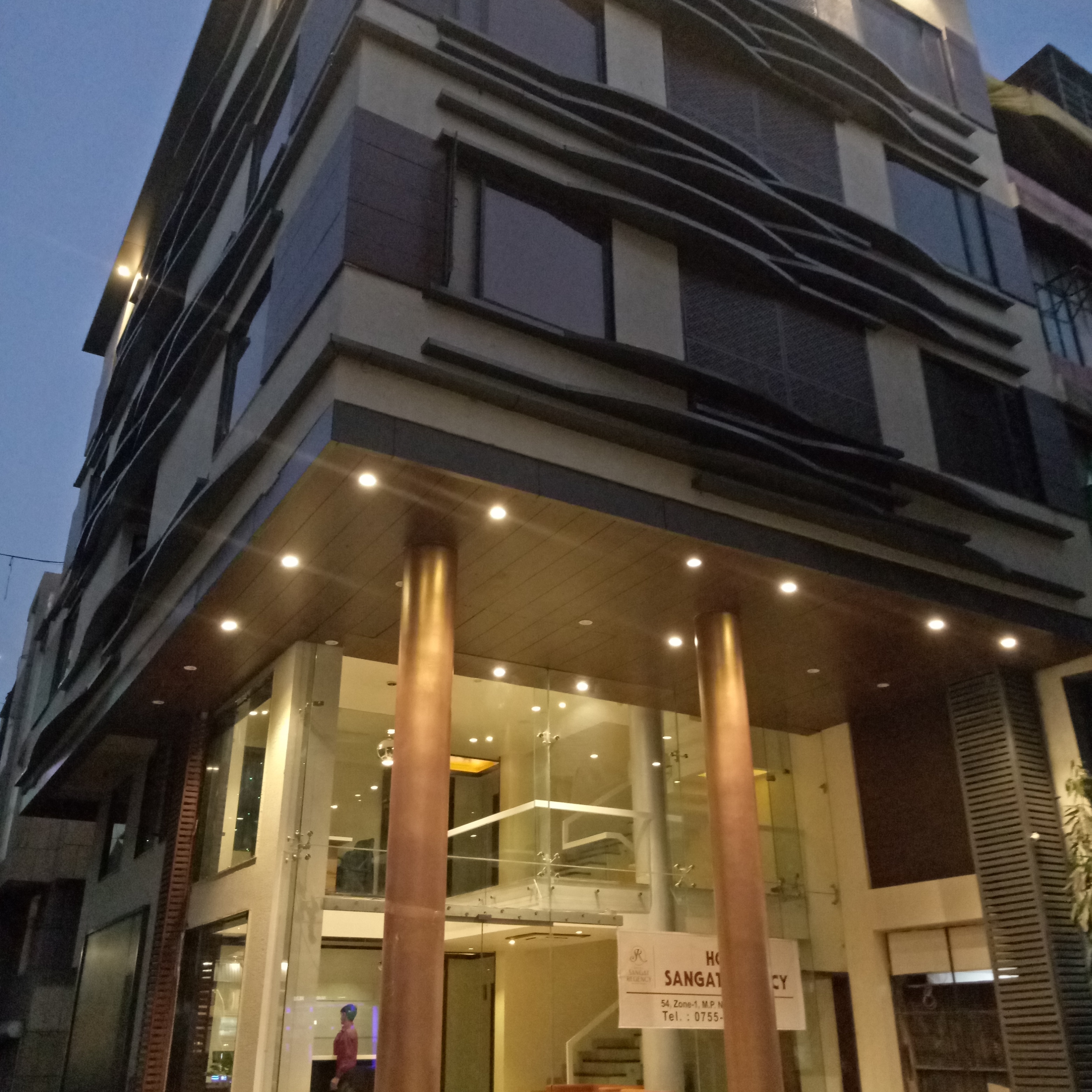 Hotel Sangat Regency - Tap to explore photos