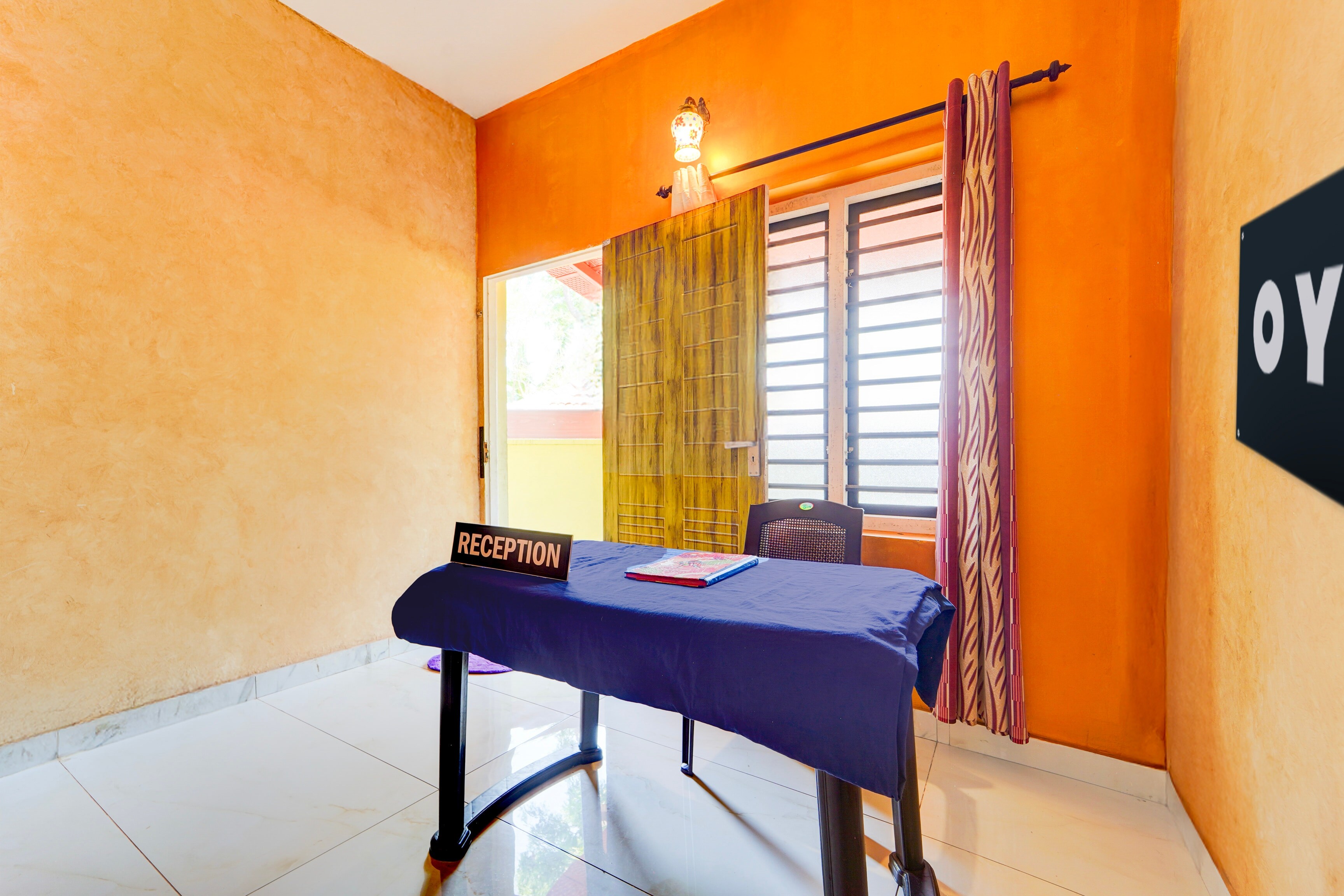 Hotel O IQ Rooms - Tap to explore photos