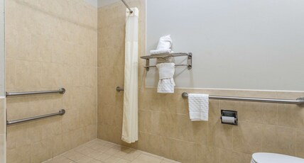 Best Western Sugarland Inn Room Type - 1 King Bed, Mobility Accessible, Communication Assistance, Roll In Shower, Non-Smoking, Full Breakfa Best Western Sugarland Inn Room Type - 1 King Bed, Mobility Accessible, Communication Assistance, Roll In Shower, Non-Smoking, Full Breakfa