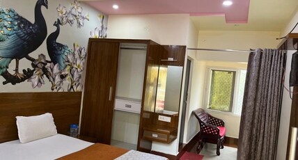 Aatitheyam yatriniwas Room Type - Premium deluxe AC