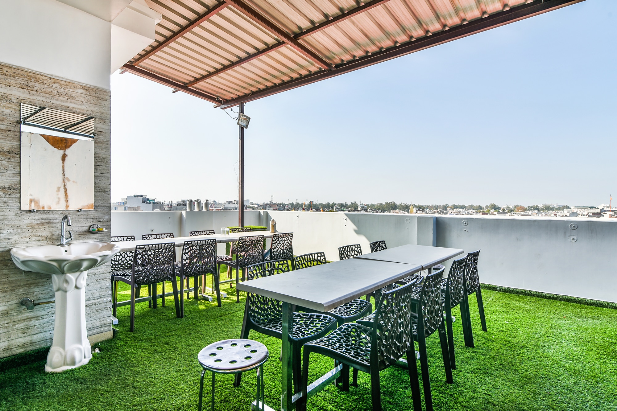 FabHotel Aman Residency - Tap to explore photos