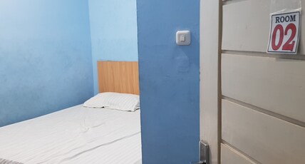 Hotel O Cempaka Syariah Room Type - Deluxe Double