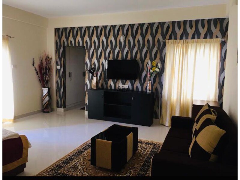 Palm 2BHK Luxury Suites & Service Apartments - Tap to explore photos