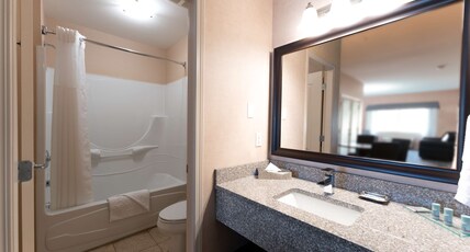 Best Western Cranbrook Hotel Room Type - Suite-1 King 1 Queen, Non-Smoking, Two Bedrooms, Sofabed, Two Televisions, Kitchenette Best Western Cranbrook Hotel Room Type - Suite-1 King 1 Queen, Non-Smoking, Two Bedrooms, Sofabed, Two Televisions, Kitchenette