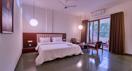 ACHUTHAM BANASURA VILLA BY VOYE HOMES Room Type - Balcony AC room