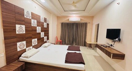 Vishal International Lodge Room Type - AC Suite Room