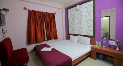 Hotel Pushpa (Berries Group of Hotels) Room Type - AC Standard Room with Sofa