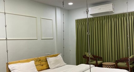 DHANLAKSHMI ORCHARD RESORT Room Type - Luxury Room With Swing Bed