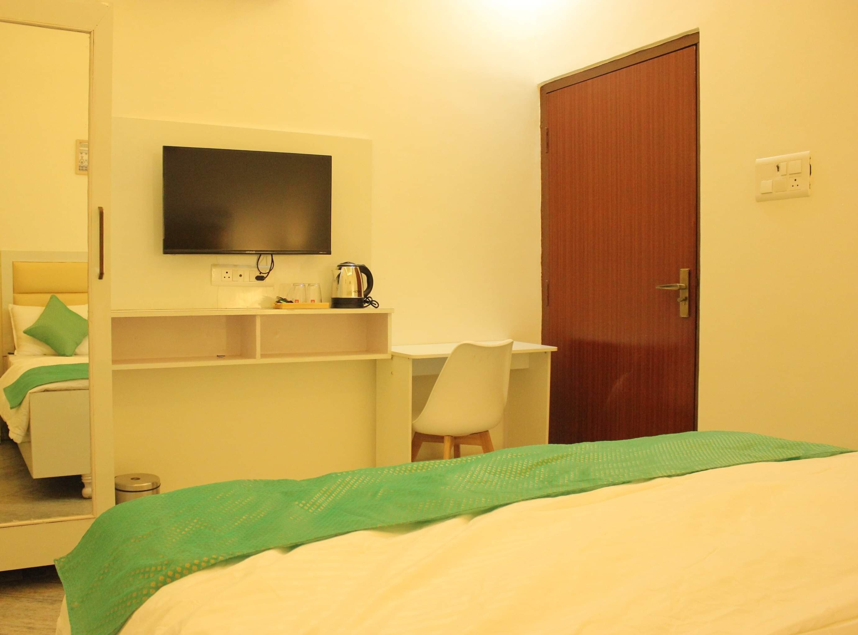 The Nandi International | A Boutique Stay - Tap to explore photos