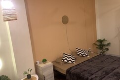 Oasis Uptown | cozy 2 BHK | Bathtub | PS4