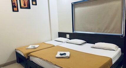 Hotel Sai Palace Inn Room Type - Triple Bed A.C. Room