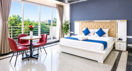 Axon Stays Near Artemis Hospital Gurgaon Sector 52 Room Type - Executive King Room with Balcony Axon Stays Near Artemis Hospital Gurgaon Sector 52 Room Type - Executive King Room with Balcony