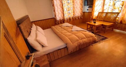 Ladakh View Homestay | Rooms & Caretaker Room Type - Wooden Room with Mountain View