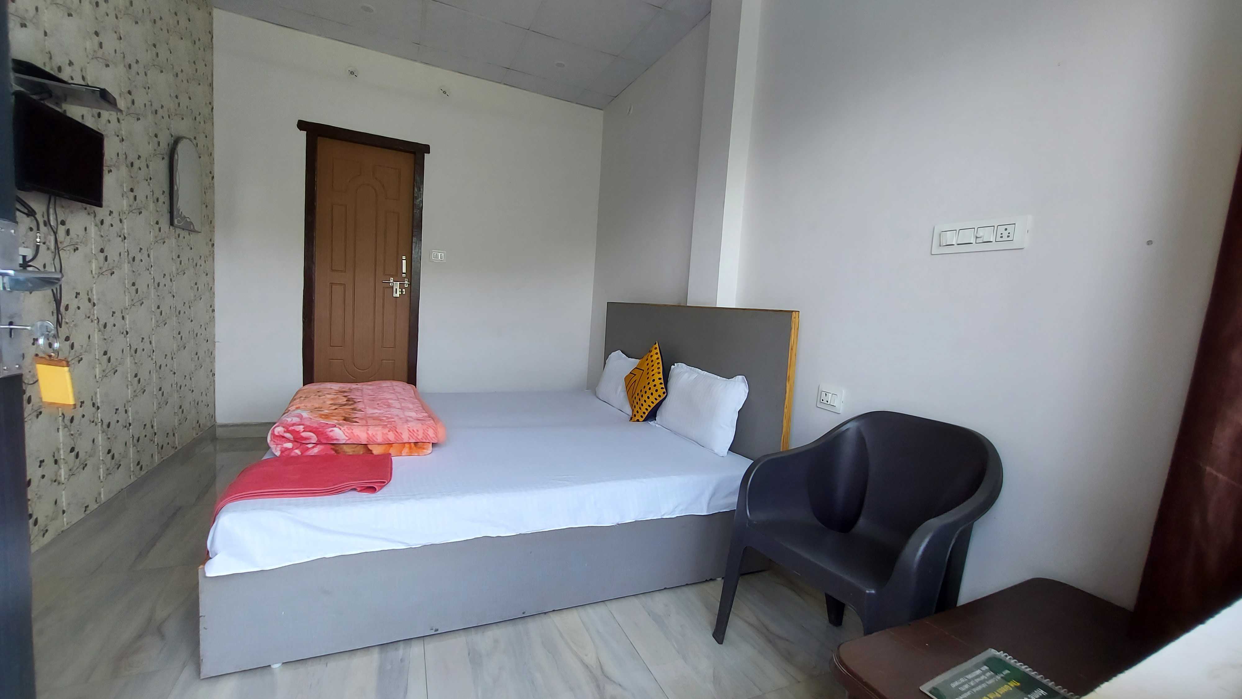 Hotel O Home Stay - Tap to explore photos