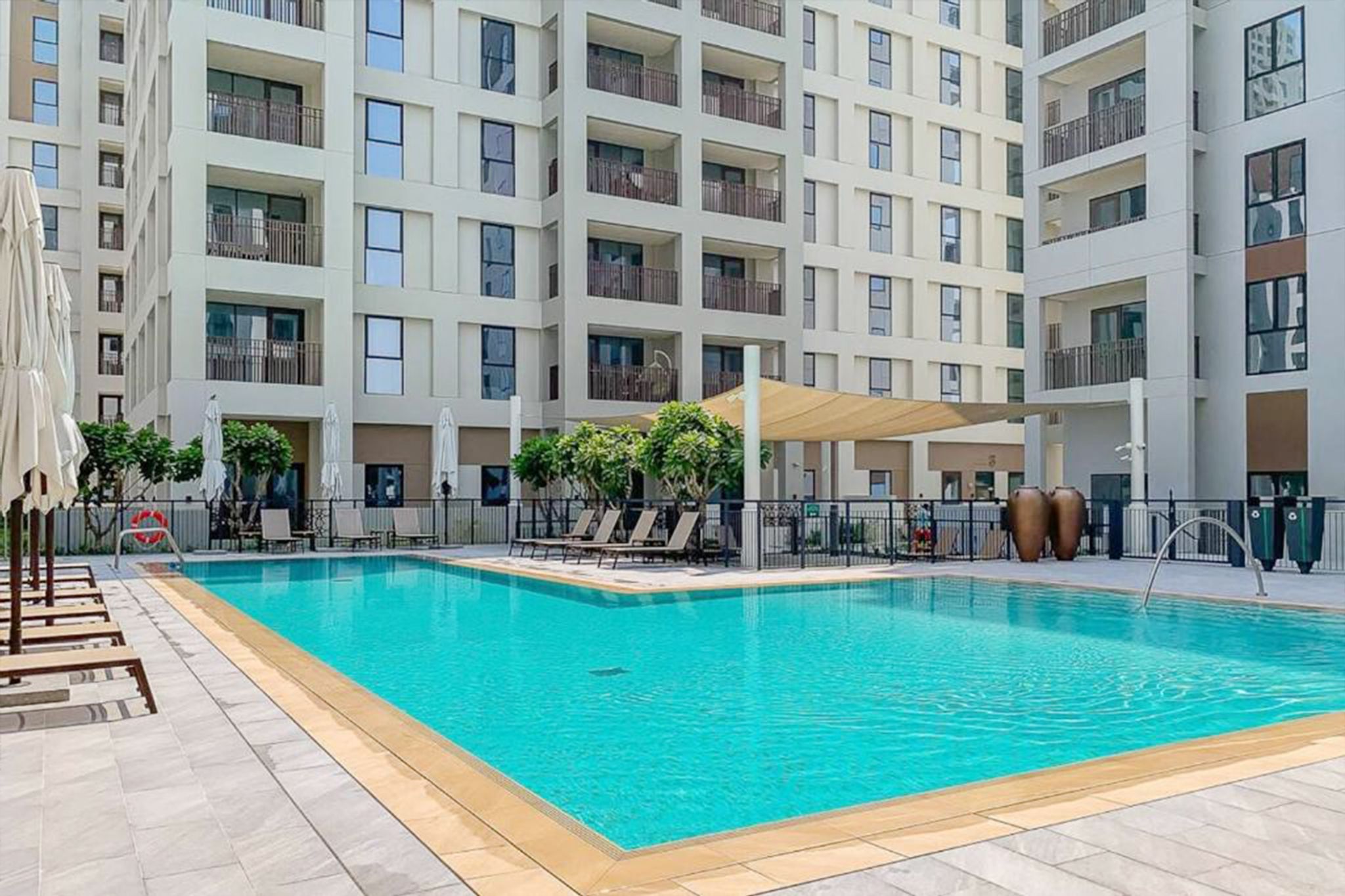 ELIVAAS Curated Elegant 2BR | Creek Beach, Pool & Gym - Tap to explore photos