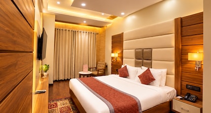 Hotel Makhan Residency Room Type - Deluxe Room With City View Hotel Makhan Residency Room Type - Deluxe Room With City View