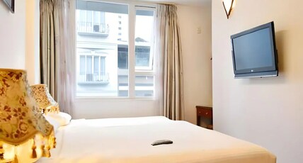 Duc Vuong Saigon Hotel - On Bui Vien Walking Street Room Type - Family Deluxe Room