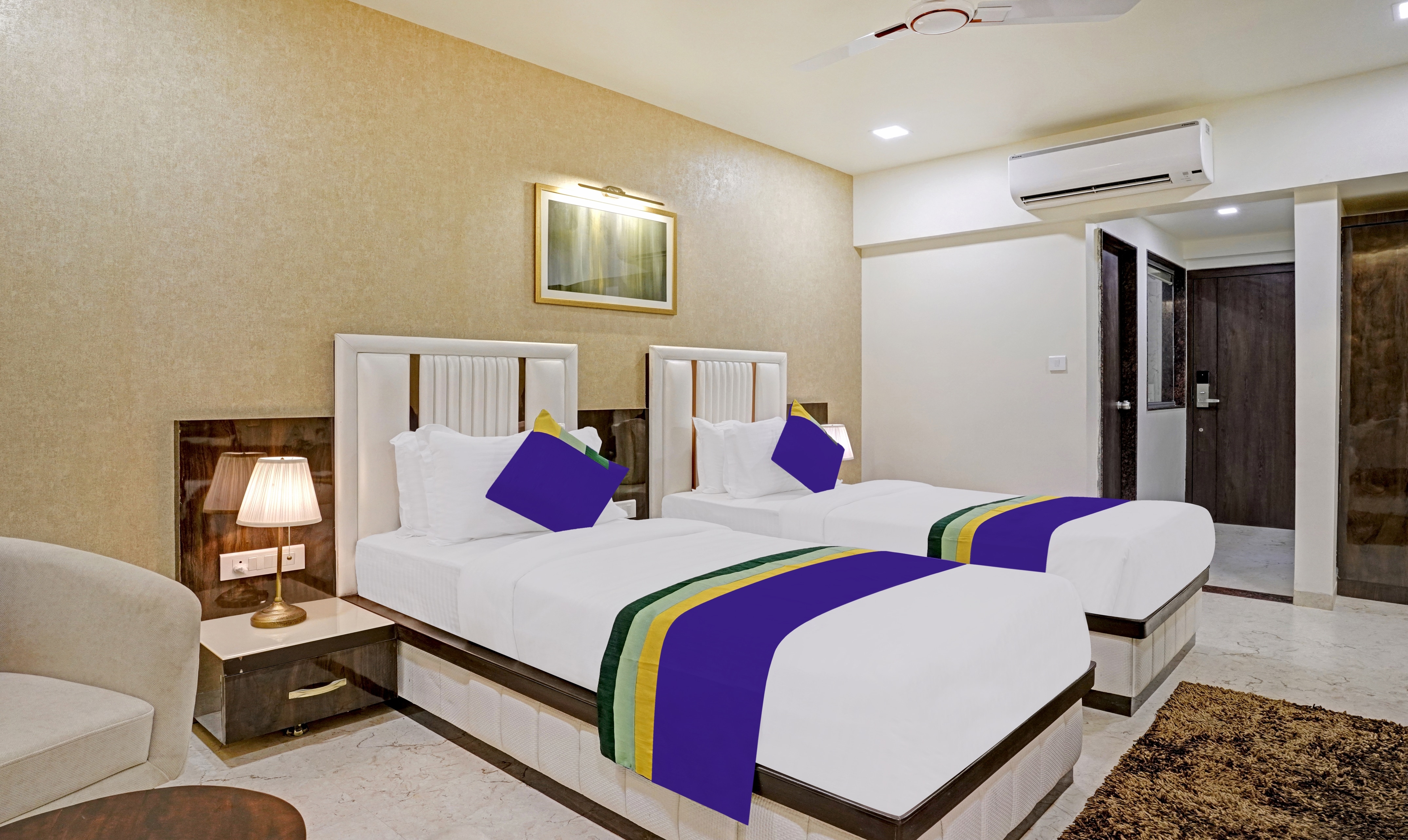 Treebo Premium Golden Bliss Trimurti Nagar Square - Tap to explore photos
