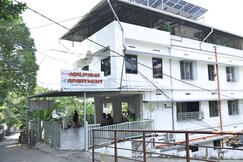 Nirupama Hotel | 700 mtrs from Aluva Railway Station