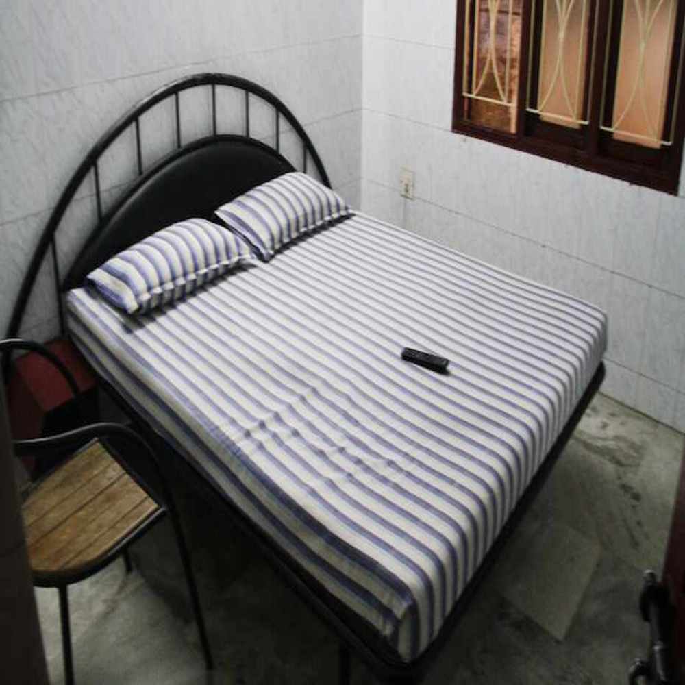 Paradise Guest House Near Marina Beach - Tap to explore photos