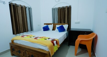 Nirmalyam (Gold homestay) Room Type - AC Family Room 201