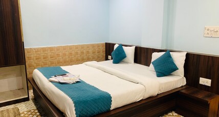 HOTEL DWARKADHISH Room Type - DELUXE ROOM