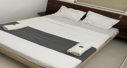 Namo Narayan Guest House Room Type - Deluxe Room with City View King Bed