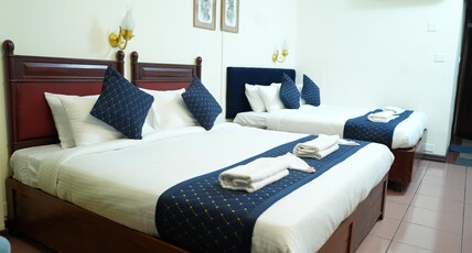 Dwaraka residency Room Type - Standard quad AC