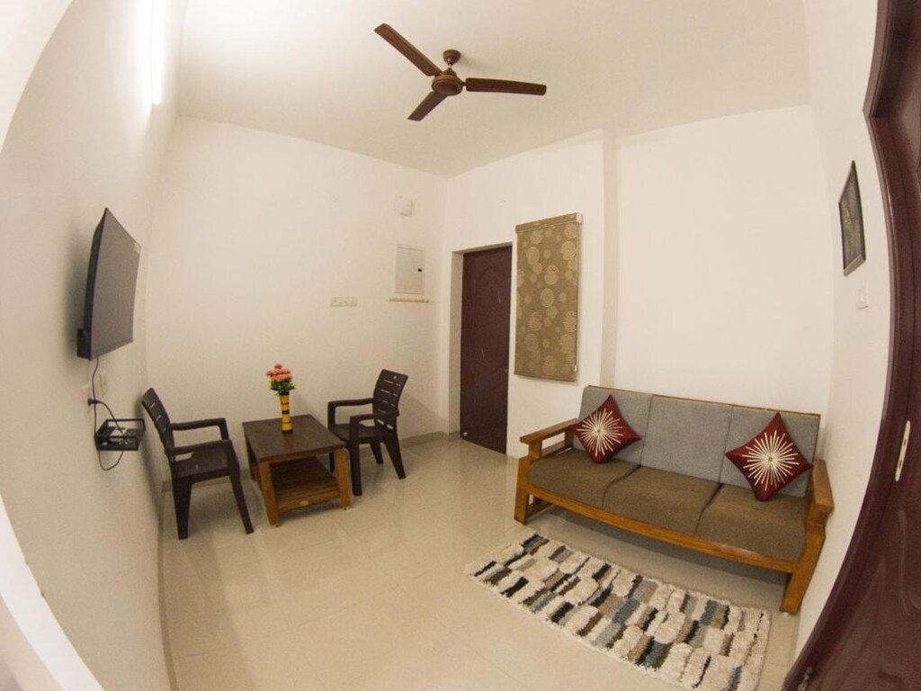 Royal Beach Service Apartment - Tap to explore photos