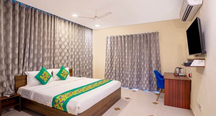 Treebo Srico Room Type - Deluxe Room With King Bed