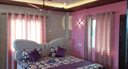 DEV- MURTI ECO RESORT ...dooars  Room Type - Hill View Luxury King Bed Room with Balcony