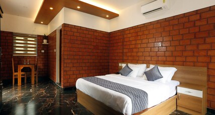 THENMALA ECO FRIENDLY HORMUZ NEST Room Type - HONEYMOON COTTAGE WITH RIVER VIEW