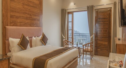 Skymount Kasauli Room Type - Luxury AC Rooms with valley View and Balcony