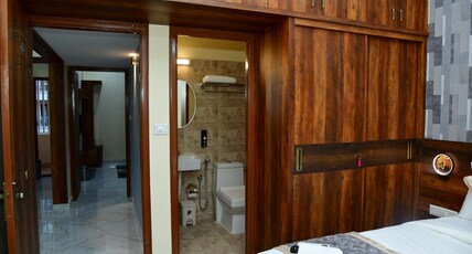 Deluxe Kings AC Room in 3 BHK Corporate IT Service Apartment Manayata Tech Park Room Type - Deluxe Queen Room