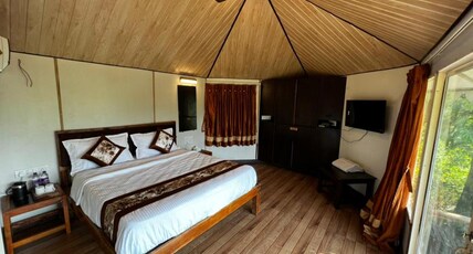 EXOTICA BEACH RESORT Room Type - AC COTTAGE ROOM  with SITOUT