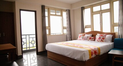 Hotel Kaso @ Flower Show (800 Mts from MG Marg) Room Type - Super Deluxe with Balcony & Mountain View Hotel Kaso @ Flower Show (800 Mts from MG Marg) Room Type - Super Deluxe with Balcony & Mountain View