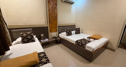 Sai Balaji Residency. 7-minute walk to Saibaba Temple. Room Type - Triple Bed AC Deluxe