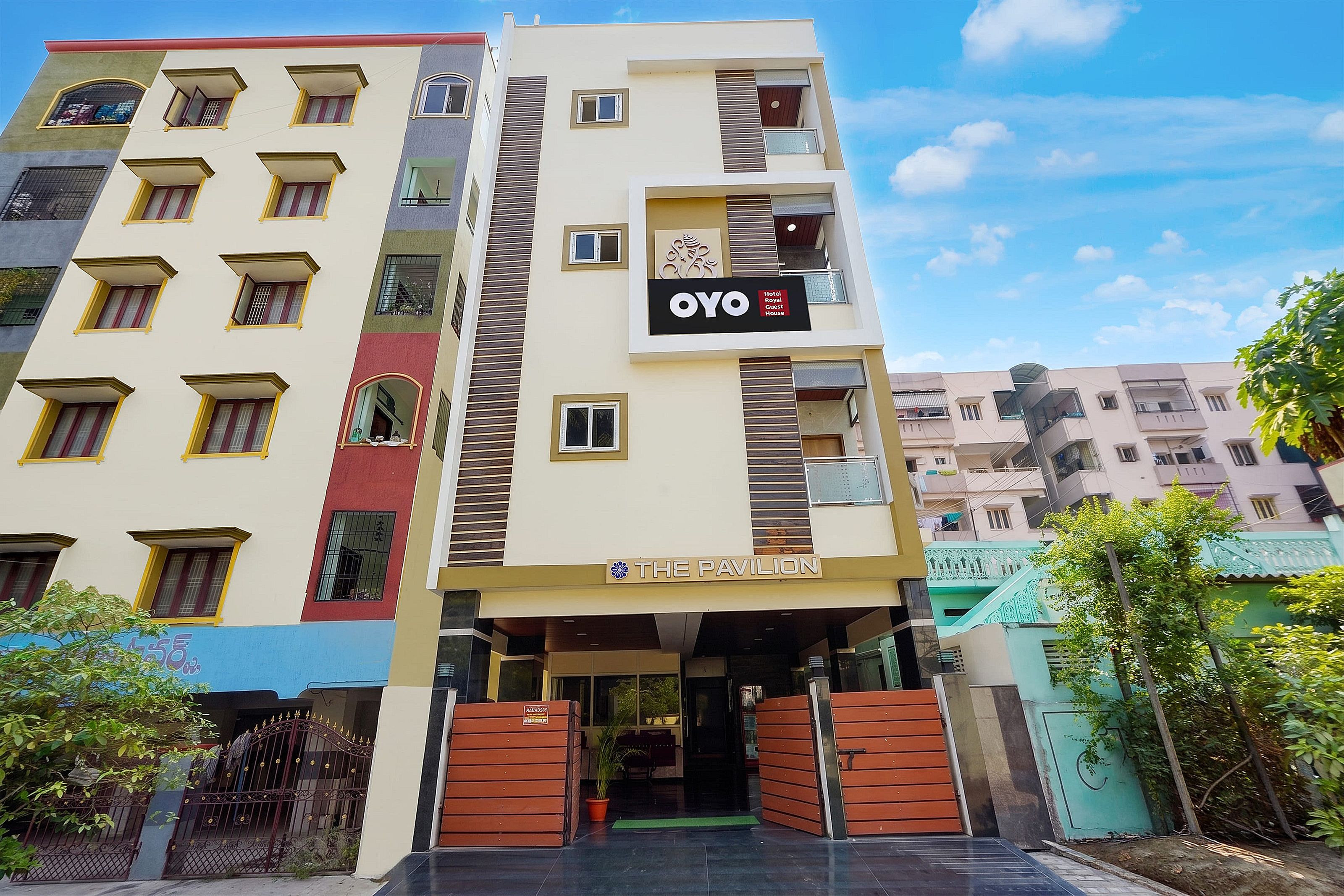 Hotel O The Royal Guest Rooms - Tap to explore photos