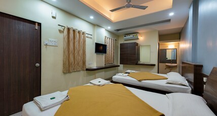 Hotel Radhakrishna Room Type - 4 Bed Room AC Hotel Radhakrishna Room Type - 4 Bed Room AC