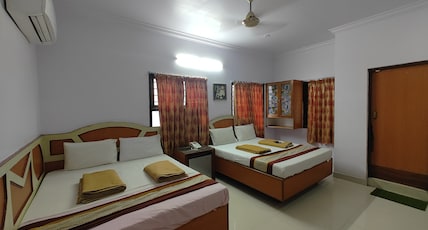 Mallika Residency, near US Consulate. Room Type - 4 BED DELUXE AC Mallika Residency, near US Consulate. Room Type - 4 BED DELUXE AC