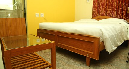 Hotel Green Grande Inn Room Type - Deluxe Room AC
