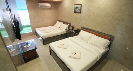 Hotel Jupiter Residency Room Type - Quadruple Occupancy Executive Suite Room with Balcony