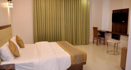 HOTEL AMBIKA INTERNATIONAL Room Type - STANDARD AC ROOM